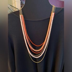 NWT Papaya necklace with seven strands set in antique brass with acrylic beads